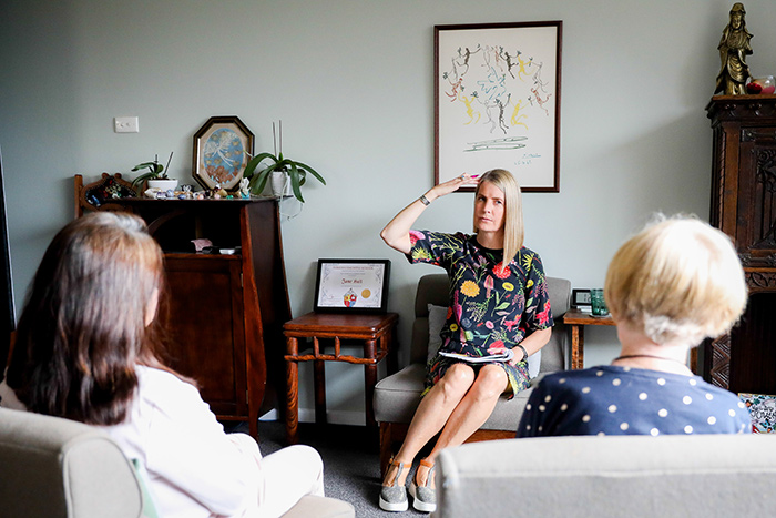 Photo of Jane Hall in an intuitive session with clients